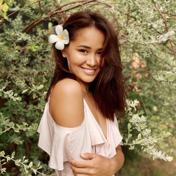 Exuding charm and grace, this Asian woman embraces her natural beauty in the midst of a blossoming garden. The flowers woven into her hair reflect her vibrant spirit and celebrate the season's joy. #BlossomingBeauty #AsianVibes #FlowerAdornment