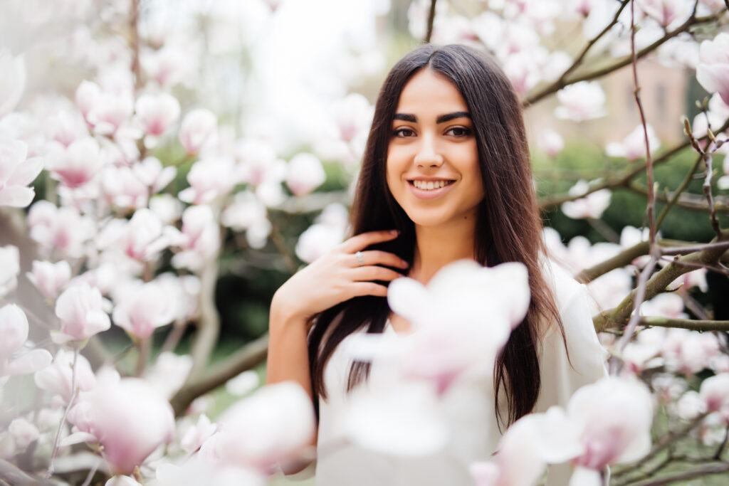 Woman in spring -Magnolia tree