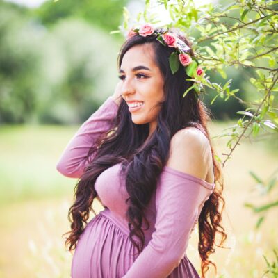 Blooming Maternity Capturing the Grace of Pregnancy in a Pink Floral Ensemble