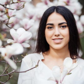 Woman in spring -Magnolia tree