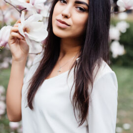 Woman in spring -Magnolia tree