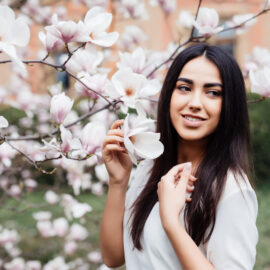 Woman in spring -Magnolia tree